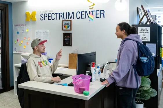 Two students engaging on conversation at the Spectrum Center