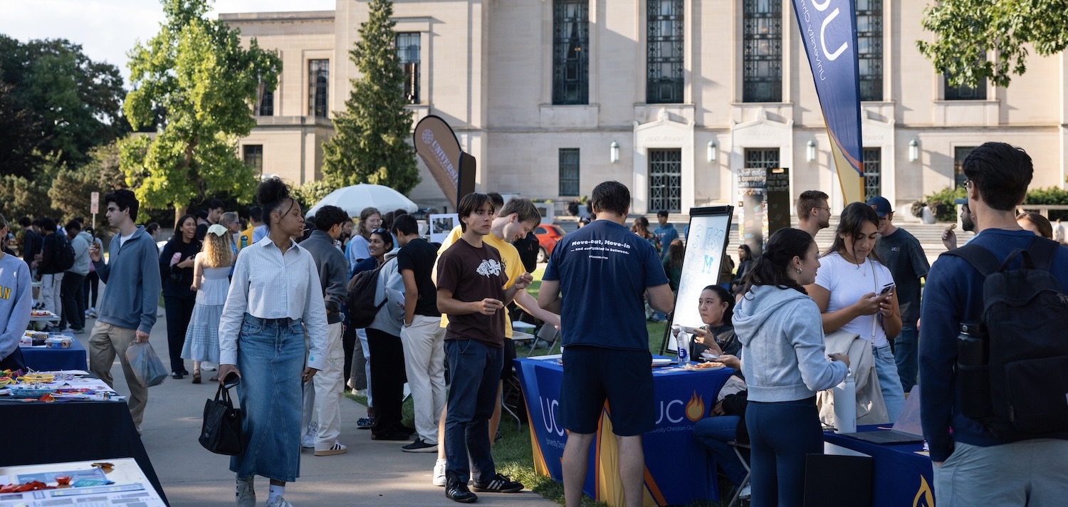 Students gathering and talking to each other during tabling at Festifaith.