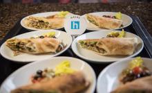 Halal chicken shawarma served on white plates