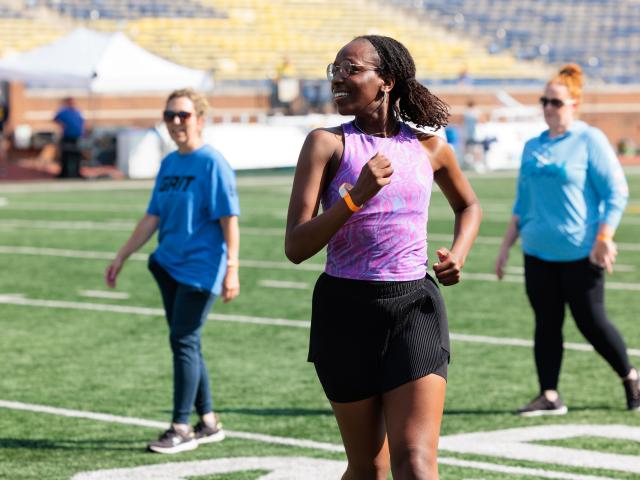 Staff and students enjoying activities and wellness classes during Be Well in the Big House.